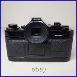 Canon A-1 SLR 35mm Film Camera 35-70mm f3.5-4.5 Lens Navy Challenge Coin Working