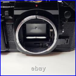 Canon A-1 SLR 35mm Film Camera 35-70mm f3.5-4.5 Lens Navy Challenge Coin Working