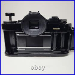 Canon A-1 SLR 35mm Film Camera 35-70mm f3.5-4.5 Lens Navy Challenge Coin Working